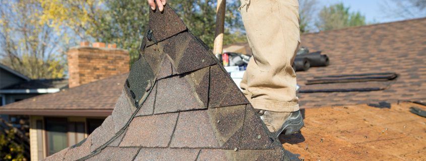 Photo showing someone replacing an old roof