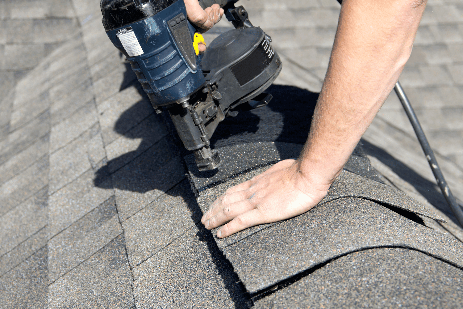 Ridge vents installed along the roof ridge for ventilation. 