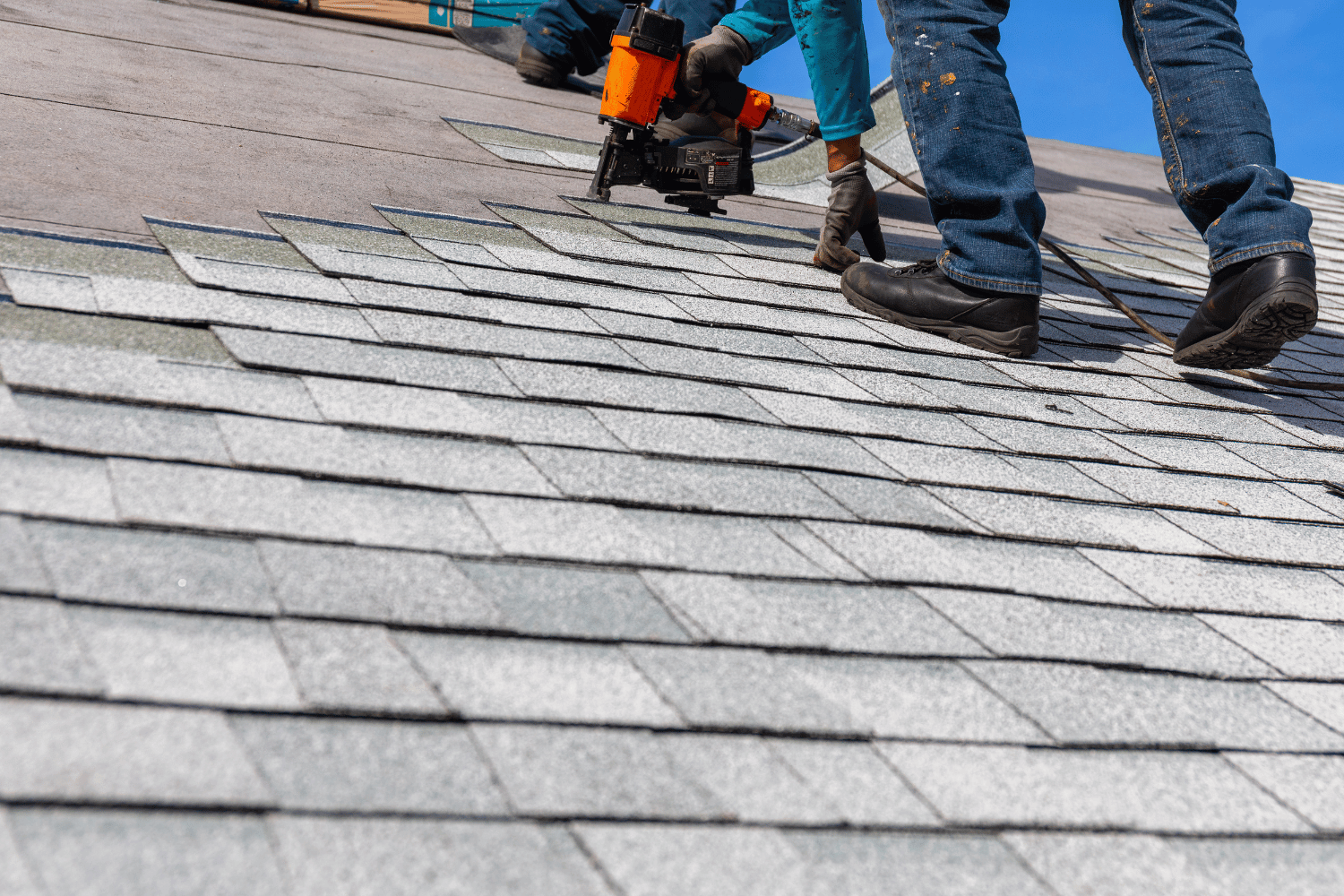 A close-up of asphalt shingles, showcasing their texture and durability. This image highlights how long asphalt shingles last. 