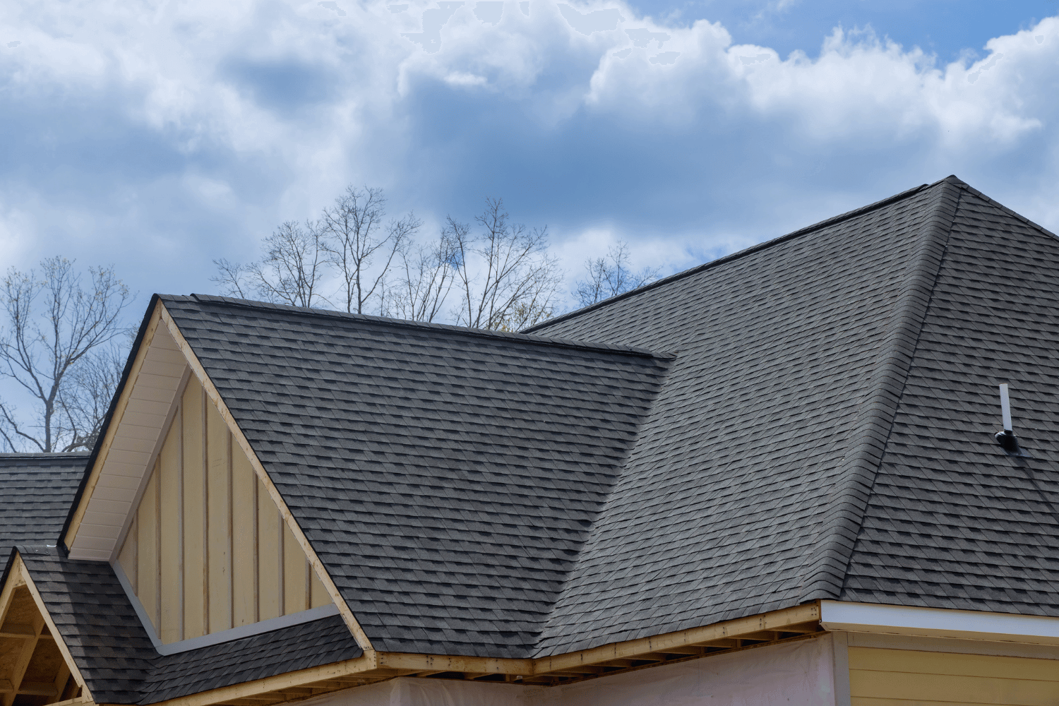 An illustration depicting various factors affecting the longevity of asphalt shingle roofs. 