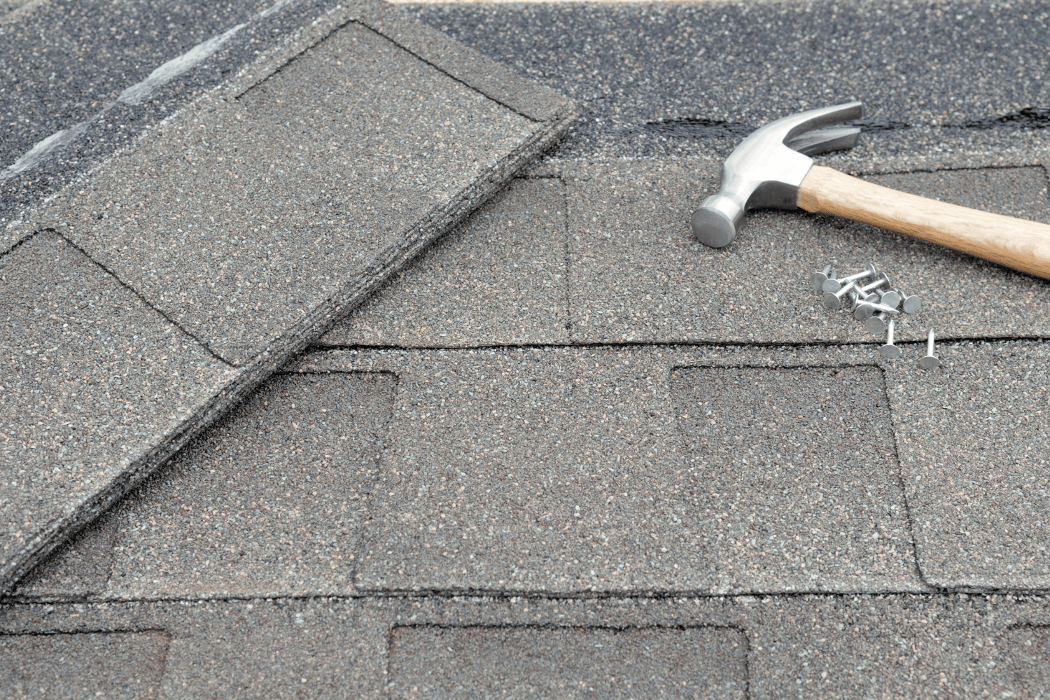 Cost considerations for repairing buckled shingles. 