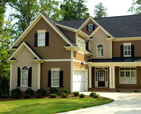 Home-Services-two-story-beige-house-white-trim