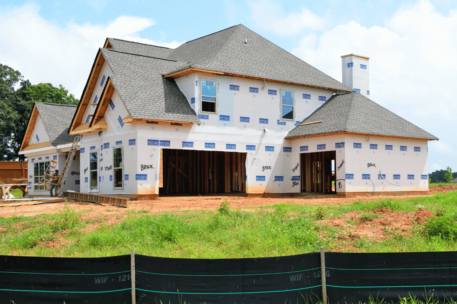 A homeowner reviewing financing options for roofing services. 