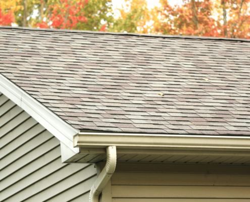 A side-by-side comparison of architectural shingles and other roofing materials.