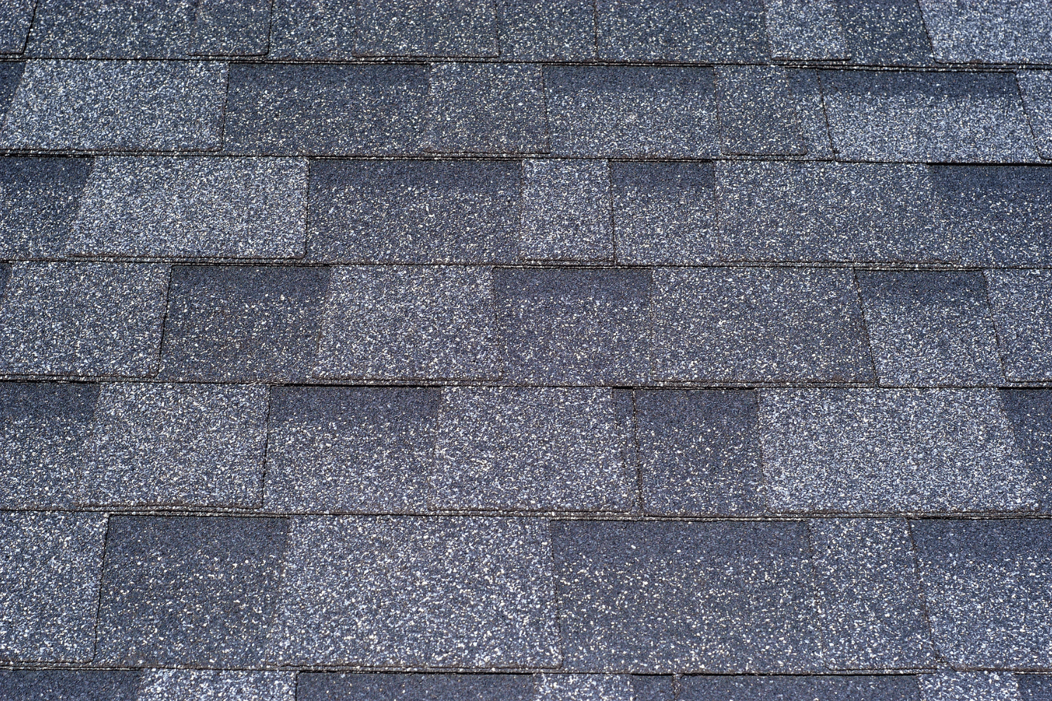 A visual representation of architectural shingles showcasing various styles and colors.