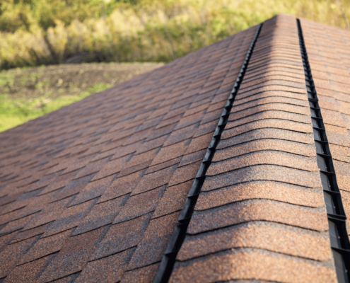 A close-up of a shingle roof with an ice and water shield.