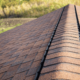 A close-up of a shingle roof with an ice and water shield.
