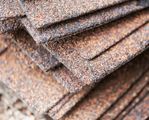 Key roofing materials including asphalt shingles and underlayment.