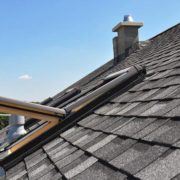 A Gray Roof Covered With shingles