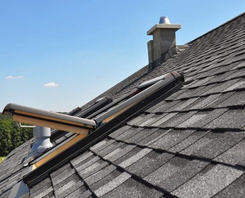 A Gray Roof Covered With shingles