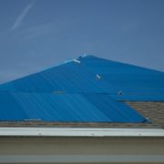 Roof tarping