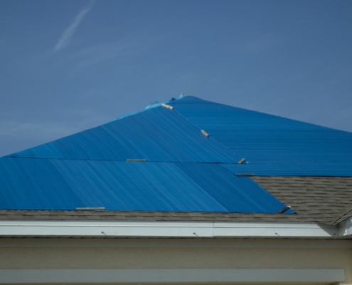 Roof tarping
